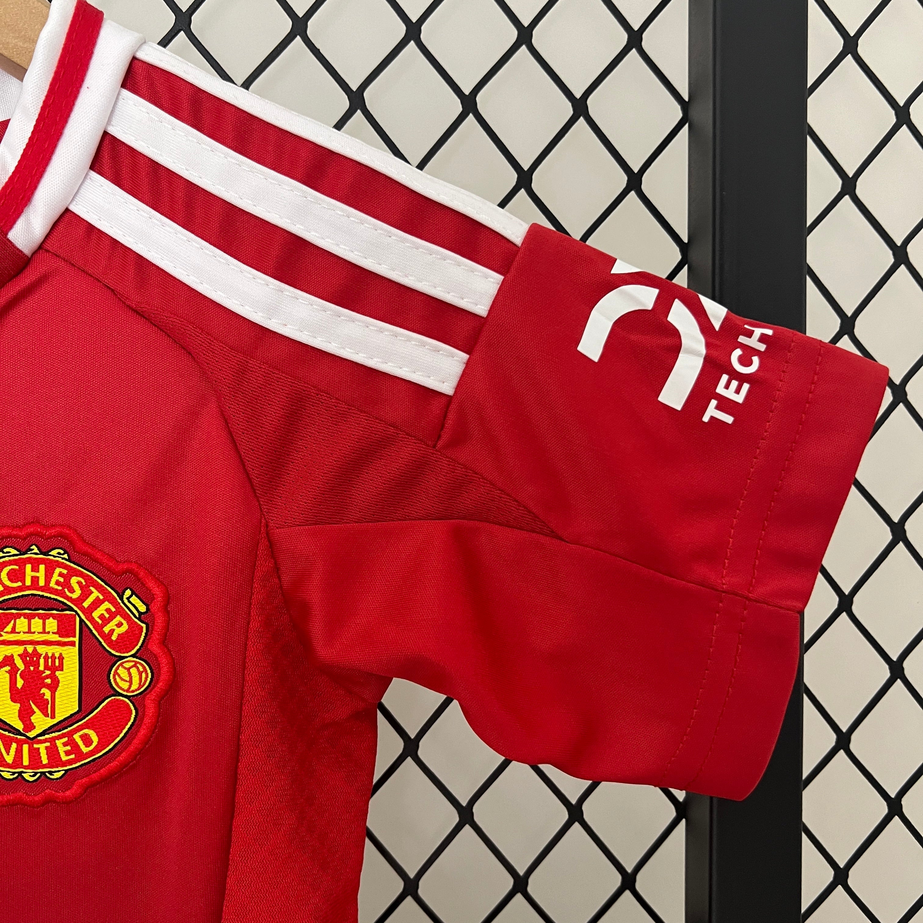T-shirt e Pantaloncini Bambino Manchester United Home 2024/25
