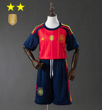 T-shirt e Pantaloncini Bambino Spagna Home 26/27 - Due volte Campione del Mondo ⭐⭐ - Con Patch