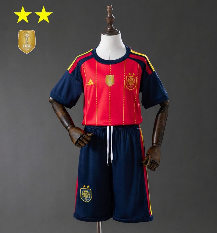 T-shirt e Pantaloncini Bambino Spagna Home 26/27 - Due volte Campione del Mondo ⭐⭐ - Con Patch